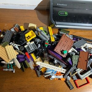 Mixed Building Brick Lot 2  Pounds of Assorted bricks, parts blocks